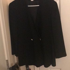Knee length, double breasted blazer.